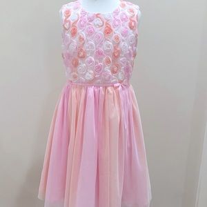 An Pink, peach, and orange flower dress, very new condition.